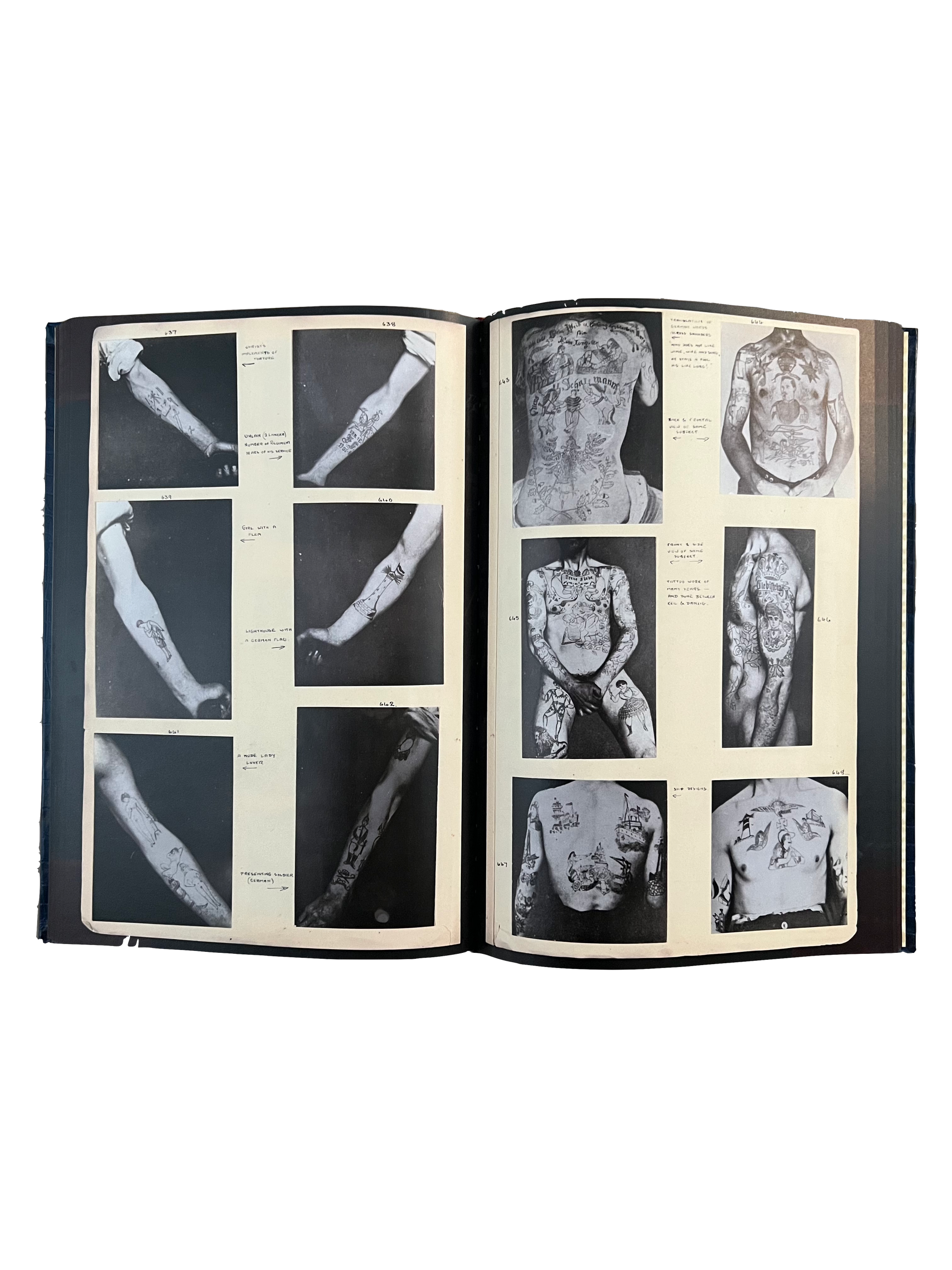 Picture from a book with bodies covered in tattoos